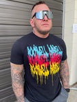 Model wearing a black shirt with Rockwell Barbell written in graffiti styled lettering. The design is repeated three times in Blue, Red, and Yellow.